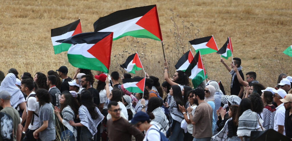 Palestinians in Gaza commemorate Nakba with flags